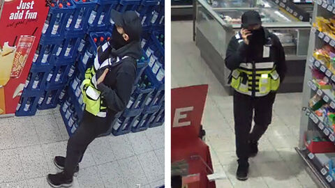 Fotos des Täters nach Raubüberfall in Grebenstein; Fotos des Täters nach Raubüberfall in Grebenstein; Foto zeigt den Täter im Lebensmittelmarkt mit dunkler Kapuze auf dem Kopf und einer Art Schal über die Nase gezogen, auffällig die gelbe Multifunktionsweste sowie schwarzen Sneaker