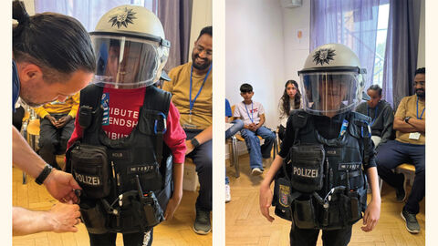 Kinder mit Schutzweste und Helm